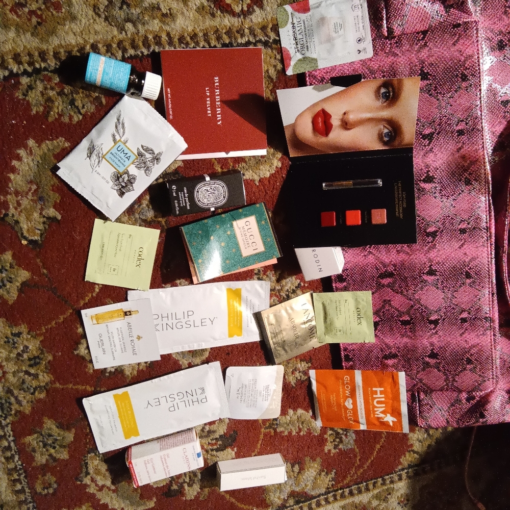 Makeup samples and bag purple bag